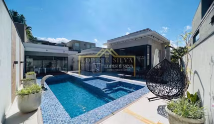 Casa com 3 dormitórios à venda, 303 m² por R$ 2.500.000,00 - Condomínio Figueira Garden - Atibaia/SP
