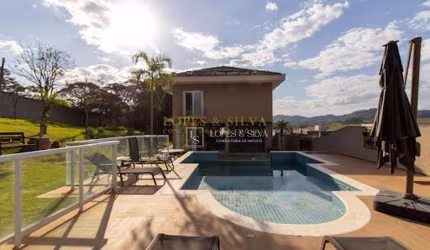 Casa com 3 dormitórios, 305 m² - venda por R$ 2.750.000,00 ou aluguel por R$ 13.538,00 - Condomínio Figueira Garden - Atibaia/SP