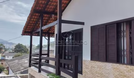 Casa com 4 quartos à venda na Rua Aracuã, 57, Pantanal, Florianópolis por R$ 1.800.000