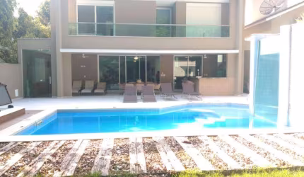 Casa com 6 dormitórios à venda por R$ 7.000.000,00 - Riviera Módulo 20 - Bertioga/SP