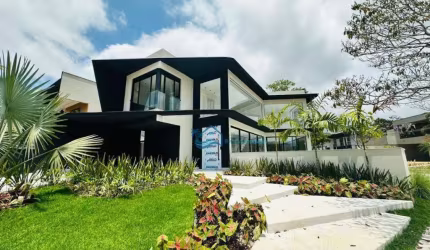Casa com 5 dormitórios à venda, 400 m² por R$ 7.800.000,00 - Riviera Módulo 24 - Bertioga/SP