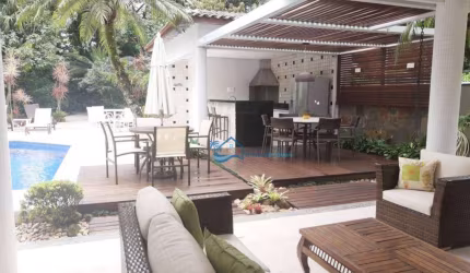 Casa com 5 dormitórios, 267 m² - venda por R$ 4.500.000,00 ou aluguel por R$ 6.000,00/dia - Riviera - Bertioga/SP