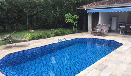 Casa com 4 dormitórios à venda, 182 m² por R$ 3.300.000,00 - Riviera - Módulo 28 - Bertioga/SP