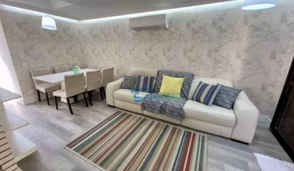 Village com 3 dormitórios à venda, 92 m² por R$ 1.490.000,00 - Riviera de São Lourenço - Bertioga/SP