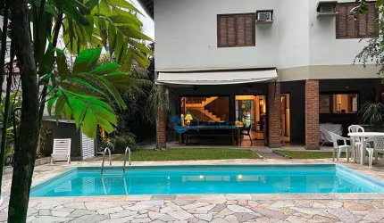 Casa com 5 dormitórios à venda, 270 m² por R$ 5.600.000,00 - Riviera Módulo 18 - Bertioga/SP