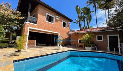 Casa com 5 dormitórios, 350 m² - venda por R$ 7.000.000,00 ou aluguel por R$ 5.900,00/dia - Riviera Módulo 5 - Bertioga/SP
