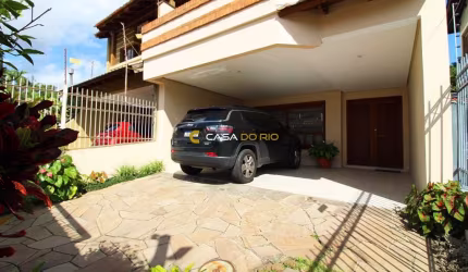 Casa com 3 quartos à venda na Avenida Copacabana, 133, Tristeza, Porto Alegre por R$ 1.330.000
