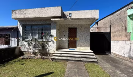 Casa com 3 quartos à venda na Rua Teotônia, 42, Camaquã, Porto Alegre por R$ 500.000