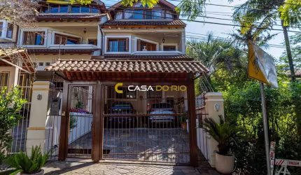 Casa em condomínio fechado com 4 quartos à venda na Travessa Pedra Redonda, 506, Jardim Isabel, Porto Alegre por R$ 990.000
