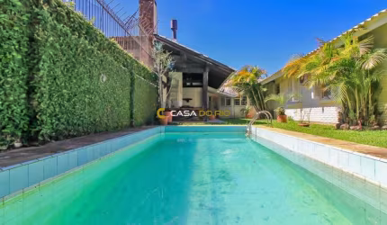 Casa com 3 quartos à venda na Rua Doutor Benjamin Camozato, 70, Jardim Isabel, Porto Alegre por R$ 1.160.000