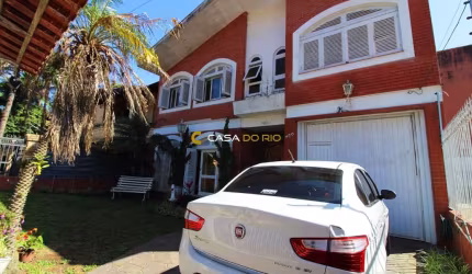 Casa com 4 quartos à venda na Rua Vicente Failace, 466, Tristeza, Porto Alegre por R$ 890.000