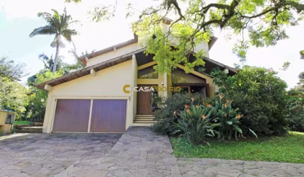 Casa em condomínio fechado com 3 quartos à venda na Avenida Firmino Octávio Bimbi, 255, Cavalhada, Porto Alegre por R$ 1.800.000
