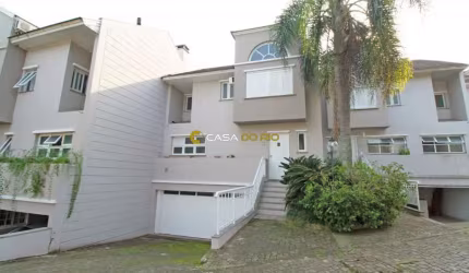 Casa em condomínio fechado com 3 quartos à venda na Avenida Coronel Marcos, 483, Pedra Redonda, Porto Alegre por R$ 1.277.000
