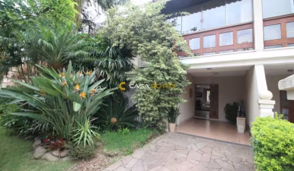 Casa em condomínio fechado com 3 quartos à venda na Avenida Eduardo Prado, 2050, Cavalhada, Porto Alegre por R$ 960.000