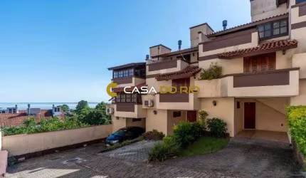 Casa em condomínio fechado com 3 quartos à venda na Avenida Wenceslau Escobar, 3714, Tristeza, Porto Alegre por R$ 497.000