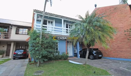 Casa em condomínio fechado com 4 quartos à venda na Rua Conrado Ferrari, 71, Jardim Isabel, Porto Alegre por R$ 870.000