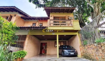 Casa com 3 quartos à venda na Rua José Kanan Aranha, 277, Jardim Isabel, Porto Alegre por R$ 820.000