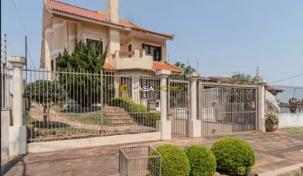 Casa com 4 quartos à venda na Rua Chiriguano, 227, Vila Assunção, Porto Alegre por R$ 1.659.000