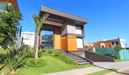 Casa em condomínio fechado com 4 quartos à venda na Estrada das Três Meninas, 2001, Vila Nova, Porto Alegre por R$ 3.200.000
