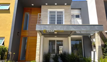 Casa em condomínio fechado com 3 quartos à venda na Rua Carlos Maximiliano Fayet, 80, Hípica, Porto Alegre por R$ 849.000