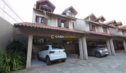 Casa em condomínio fechado com 3 quartos à venda na Rua Doutor Possidônio Cunha, 273, Vila Assunção, Porto Alegre por R$ 720.000