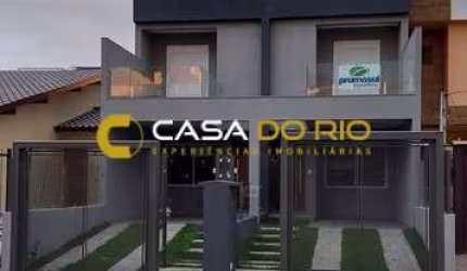 Casa com 3 quartos à venda na Rua Itacyr Rossi, 33, Guarujá, Porto Alegre por R$ 560.000
