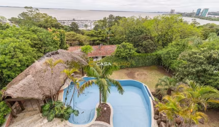 Casa com 4 quartos à venda na Rua Bororó, 301, Vila Assunção, Porto Alegre por R$ 4.000.000