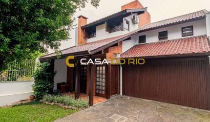 Casa com 3 quartos à venda na Rua Almirante Delamare, 170, Tristeza, Porto Alegre por R$ 1.200.000