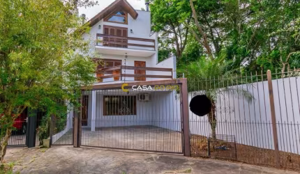 Casa em condomínio fechado com 3 quartos à venda na Rua Jayme Saul de Borba, 72, Espírito Santo, Porto Alegre por R$ 538.000