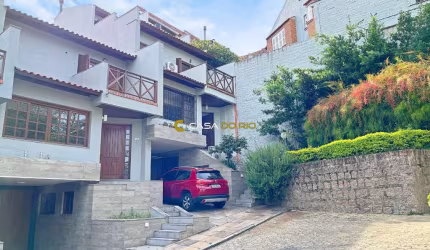 Casa em condomínio fechado com 4 quartos à venda na Rua Landel de Moura, 1505, Tristeza, Porto Alegre por R$ 1.100.000