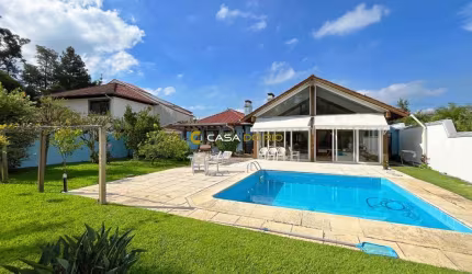 Casa em condomínio fechado com 3 quartos à venda na Avenida Juca Batista, 8000, Belém Novo, Porto Alegre por R$ 1.880.000