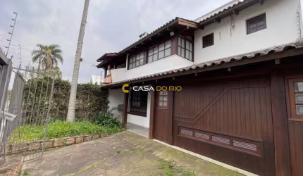 Casa com 3 quartos à venda na Rua Mampituba, 246, Ipanema, Porto Alegre por R$ 650.000