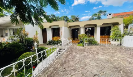 Casa com 4 quartos à venda na Avenida Pereira Passos, 756, Vila Assunção, Porto Alegre por R$ 1.300.000
