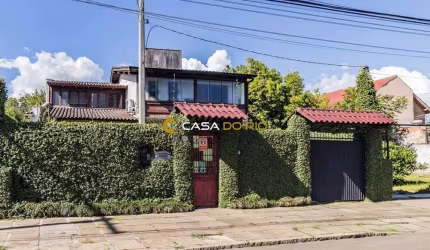 Casa com 3 quartos à venda na Avenida Guarujá, 140, Guarujá, Porto Alegre por R$ 749.000