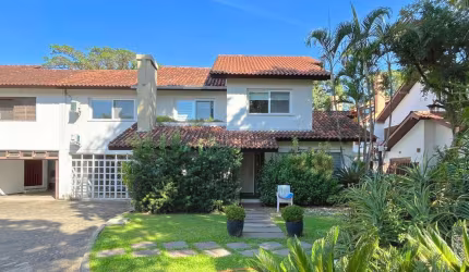 Casa em condomínio fechado com 4 quartos à venda na Rua Manoel Leão, 55, Pedra Redonda, Porto Alegre por R$ 1.390.000