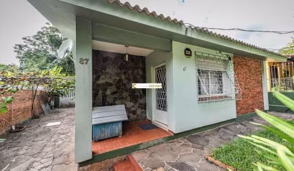 Casa em condomínio fechado com 3 quartos à venda na Acesso das Tulipas, 87, Santa Tereza, Porto Alegre por R$ 383.000