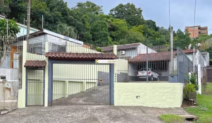 Casa com 3 quartos à venda na Avenida Vicente Monteggia, 2406, Vila Nova, Porto Alegre por R$ 495.000