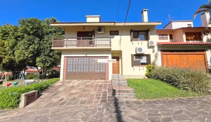Casa em condomínio fechado com 3 quartos à venda na Praça São Caetano, 90, Teresópolis, Porto Alegre por R$ 1.280.000