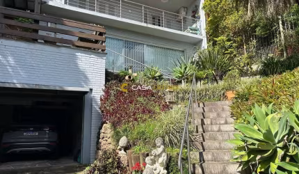 Casa com 3 quartos à venda na Rua Edgar Luiz Schneider, 480, Jardim Isabel, Porto Alegre por R$ 1.250.000
