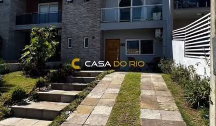 Casa em condomínio fechado com 3 quartos à venda na Rua Fabiana Kila de Ávila, 165, Hípica, Porto Alegre por R$ 799.000