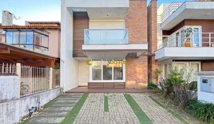 Casa em condomínio fechado com 3 quartos para alugar na Rua Carlos Maximiliano Fayet, 80, Hípica, Porto Alegre