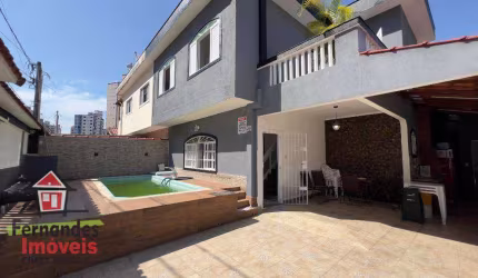 Sobrado com piscina próximo da praia  3 dormitórios mais dependência para alugar definitivo pacote  123 m² por R$ 7.000 mês  Ocian  Praia Grande SP
