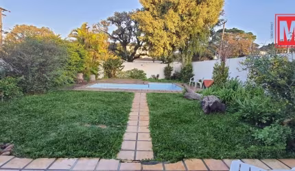 CASA COM TERRENO !! ou quer troca por apto na praia de Sc.