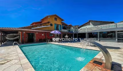 Casa Porteira Fechada com 7 dormitórios, sendo 6 suítes, piscina, salão de festa, área gourmet à venda, 650 m², por R$ 1.280.000 - Maricá/RJ