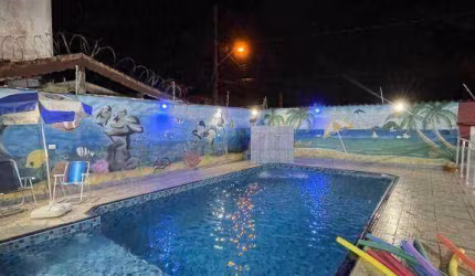 Casa com 3 dormitórios à venda, 130 m² por R$ 1.000.000 - Maracanã - Praia Grande/SP