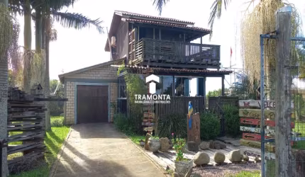 Esta encantadora casa está disponível para venda no tranquilo bairro Morro Agudo em Araranguá. SC