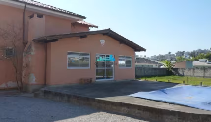 Casa em condomínio fechado com 3 quartos à venda em Pedra Branca, Palhoça  por R$ 600.000