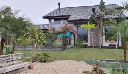Casa em condomínio fechado com 5 quartos à venda no Cacupé, Florianópolis  por R$ 4.800.000