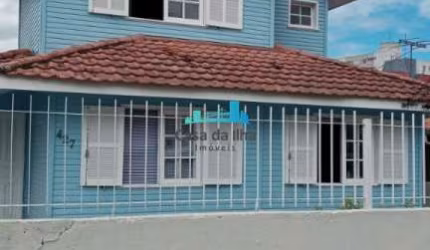 Casa com 4 quartos à venda na Praia Comprida, São José  por R$ 900.000