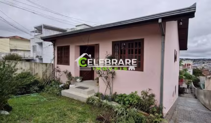 TERRENO COM CASAS PARA INVESTIMENTO NO BAIRRO ALTO.
